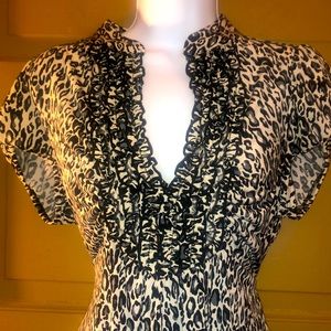 Leopard print top. XL. Polyester/spandex.